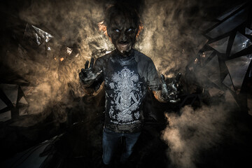scary sorcerer in smoke. voodoo rite
