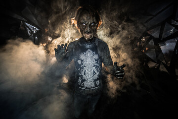 scary sorcerer in smoke. voodoo rite