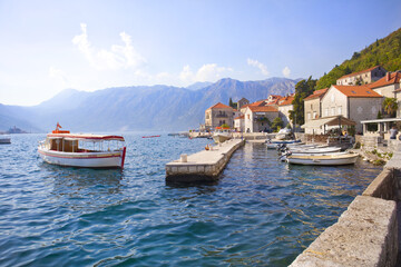 Fototapeta na wymiar Pier with boats in Perast, Montenegro