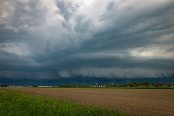 Roll cloud or arcus belonging to a severe thunderstorm over the fields of Holland