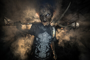 scary sorcerer in smoke. voodoo rite