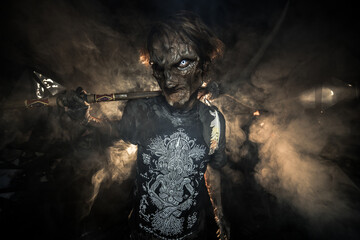 scary sorcerer in smoke. voodoo rite