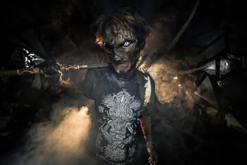 scary sorcerer in smoke. voodoo rite