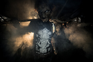 scary sorcerer in smoke. voodoo rite