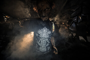 scary sorcerer in smoke. voodoo rite