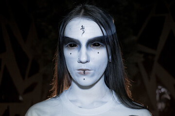 the sorceress stands in the smoke. voodoo rite