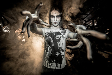 the sorceress stands in the smoke. voodoo rite