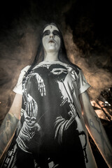 Naklejka premium the sorceress stands in the smoke. voodoo rite