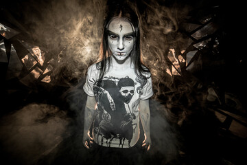 the sorceress stands in the smoke. voodoo rite