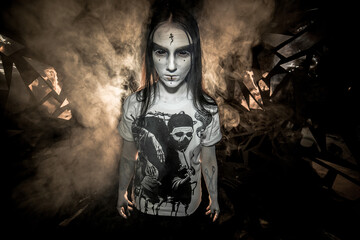 the sorceress stands in the smoke. voodoo rite