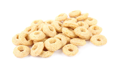 Pile of tasty corn rings on white background. Healthy breakfast cereal