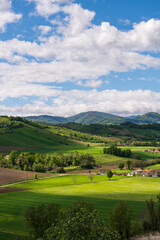Naklejka na ściany i meble View of the cultivated Emilian hills, Italy.