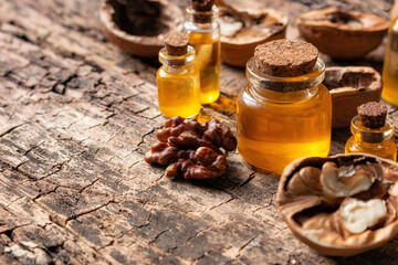 natural organic walnut cosmetics on wooden background with space for text