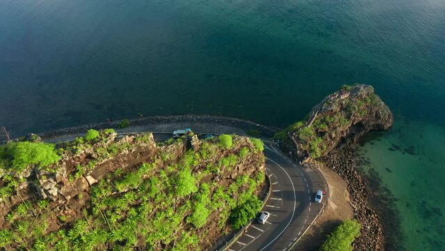 Maconde beach bathing in beautiful sunlight with amazing surrounding landscape. Aerial shot of beautiful Mauritius scenery.