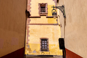 Zacatecas, Mexico, colorful colonial old city streets in historic center near central cathedral.