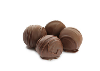 Delicious sweet chocolate truffles on white background