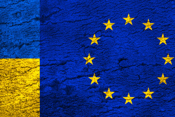 Europe union and Ukraine flags background. Pray for Ukraine and Stop the war concept photo
