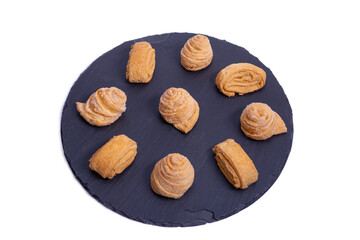 homemade cookies on a round stone board
