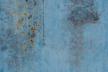 Metal texture with different degrees of corrosion. Old and rusty surface structure of the metal painted with blue paint, high resolution.