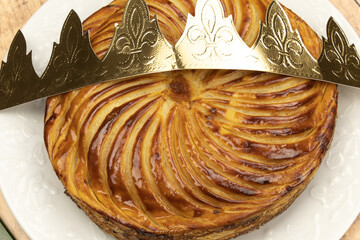 close up galette des rois, king's epiphany cake with a crown