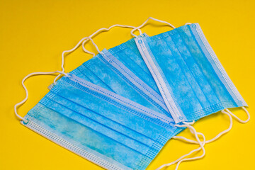 Close up and detail of medical hygienic mask, face protective surgical masks isolated.