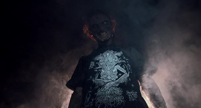 scary sorcerer in smoke. voodoo rite