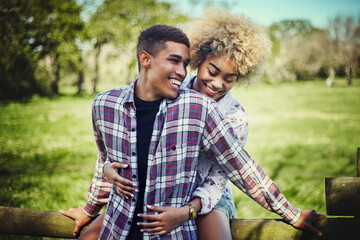 I never knew I could love this much. Shot of a young couple spending quality time together at the park.