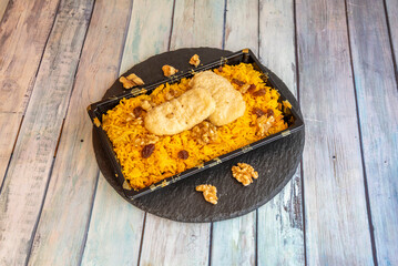 Sayadieh is a Syrian/Lebanese seasoned fish and rice dish made with cumin and other spices. The...
