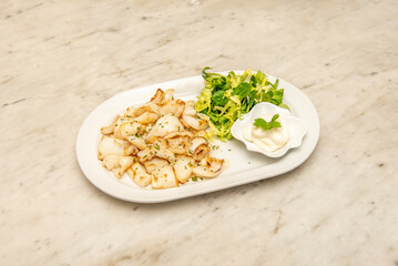 Grilled cuttlefish with garlic and parsley with this rich and easy recipe