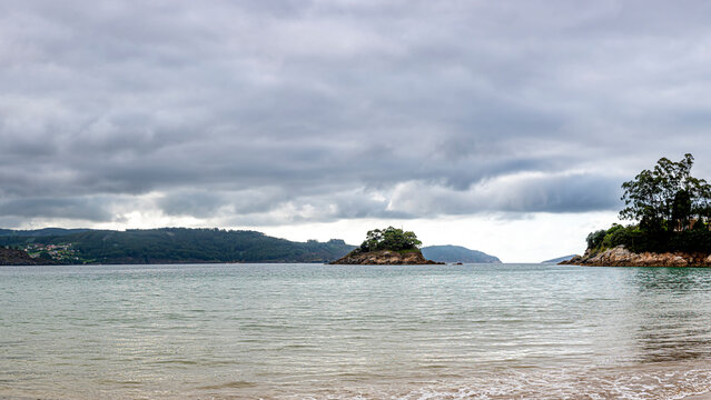 Islet on the lonely beach of the Atlantic Sea