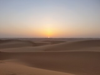 Fototapeta na wymiar Sunset on Wahiba Sand Dunes, Oman