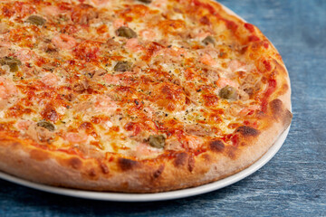 pizza on the wooden background