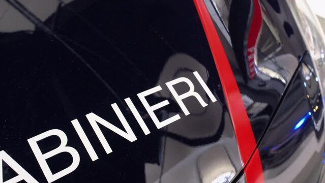 Sliding footage of the writing CARABINIERI on an Italian security forces vehicle 