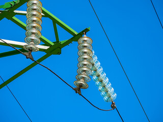 A part of the electricity grid. High voltage. Transmission line Insulators.