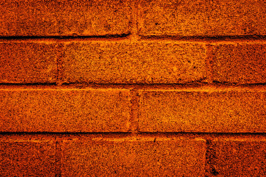 mur de brique orange, fond orange