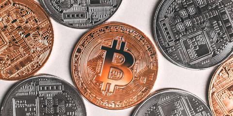 cryptocurrency golden bitcion and silver bitcoins, abstract bitcoins background.