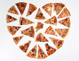 Pizza isolated on white in the shape of a heart