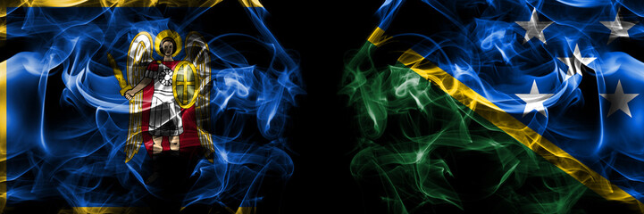 Kyiv, Kiev vs Solomon Islands flag. Smoke flags placed side by side isolated on black background.