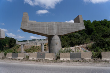 new concrete bridge supports have been built on the side of the highway