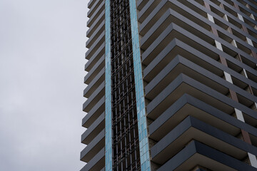 a very large apartment building that forms an interesting pattern and ornament