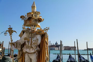 Zelfklevend Fotobehang Venice, Italy - February 2022 - carnival masks are photographed with tourists in San Marco square © Renato68