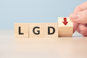 Concept Loss given default or LGD. business acronym. Cubes with letters and an arrow down.
