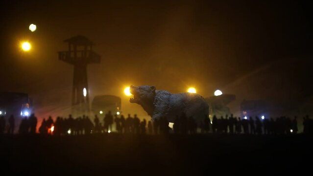 Creative artwork decoration - Russian war in Ukraine concept. Crowd looking on giant explosion and attacking giant bear. Selective focus