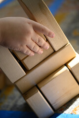 Obraz premium Letting The Child Lead The Construction of This Tower At Preschool Early Morning DETROIT MI