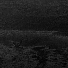 Dark grey black slate background or texture.