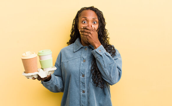 black pretty woman covering mouth with hands with a shocked