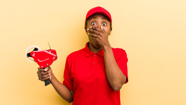 black pretty woman covering mouth with hands with a shocked