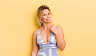 blonde pretty woman looking arrogant, successful, positive and proud
