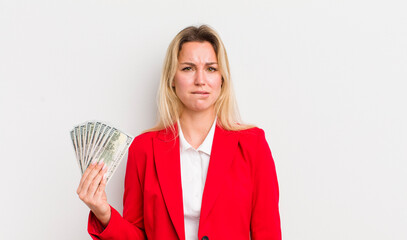 blonde pretty woman looking puzzled and confused