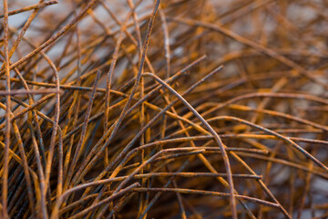 armature rusty rods for building a house in a house under construction